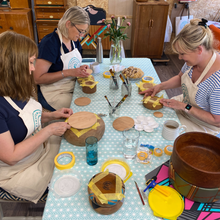 Load image into Gallery viewer, Four woman attending a bowl painting workshop