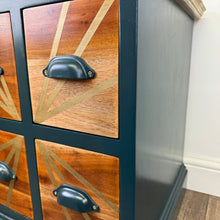 Load image into Gallery viewer, Teal and gold handpainted upcycled solid wooden drawers with gold sunburst design on the top and teal cup handles