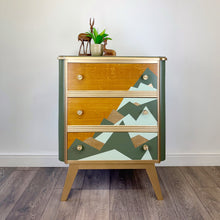 Load image into Gallery viewer, upcycled mid century chest of drawers mountain design in green and gold