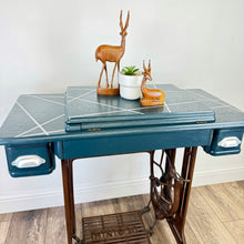 Load image into Gallery viewer, singer sewing machine table painted in blue with silver line design