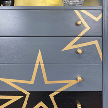 Load image into Gallery viewer, Grey and black upcycled mid century storage unit with handpaingted gold stars