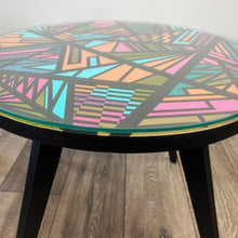 Load image into Gallery viewer, Round coffee table handpainted in bright colours and a geometric design
