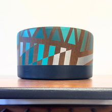 Load image into Gallery viewer, wooden vintage bowl handpainted with blue and silver geometric design
