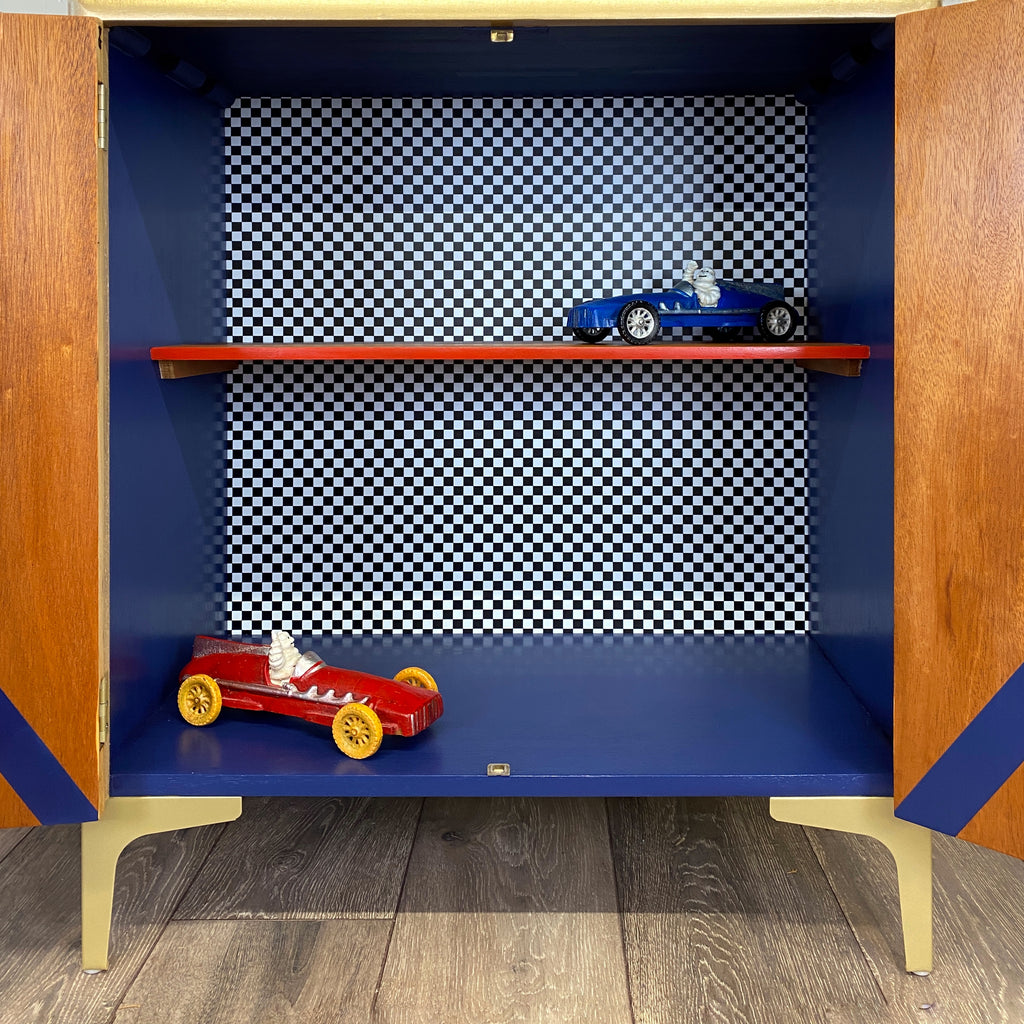 Upcycled cocktail cabinet with red, gold and blue stripes