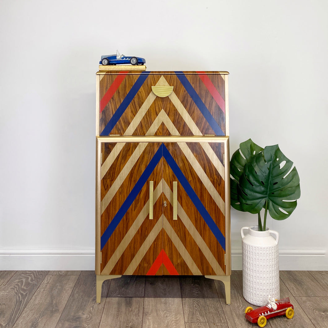 Upcycled cocktail cabinet with red, gold and blue stripes