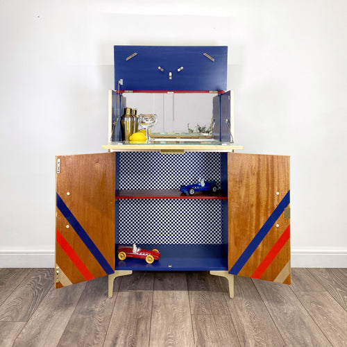 Upcycled cocktail cabinet with red, gold and blue stripes