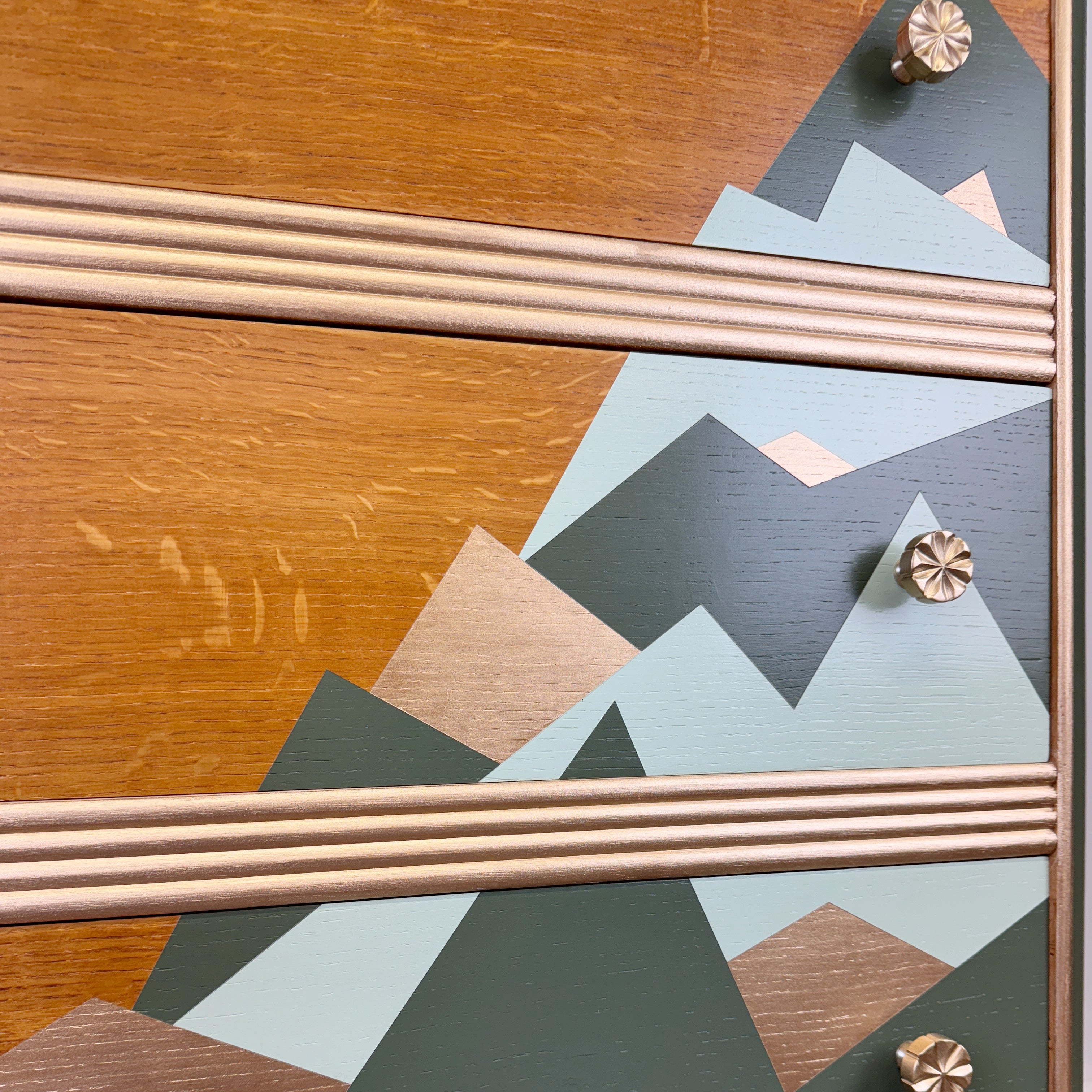 upcycled mid century chest of drawers mountain design in green and gold