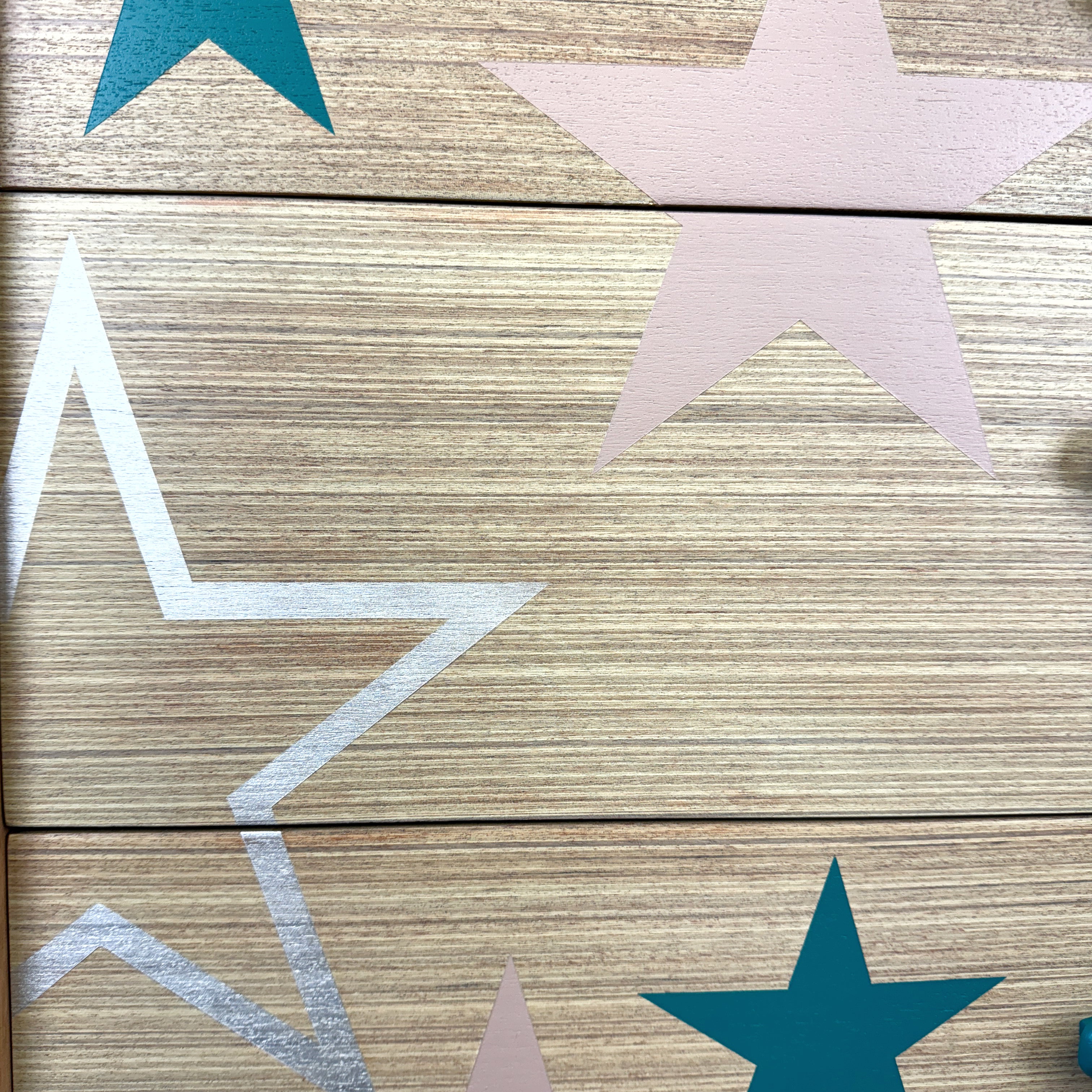 Mid century chest of drawers upcycled with pink teal and silver stars