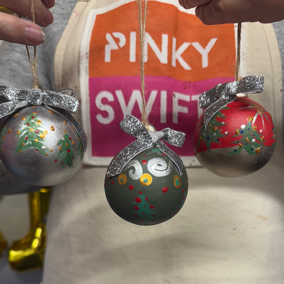 Three handpainted ceramic christmas baubles