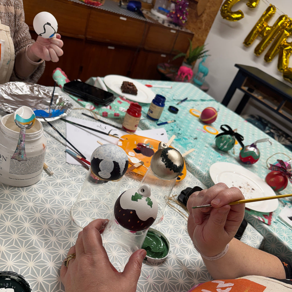 Christmas ceramic bauble painting workshop hosted by pinkyswifts in their furniture upcycling studio