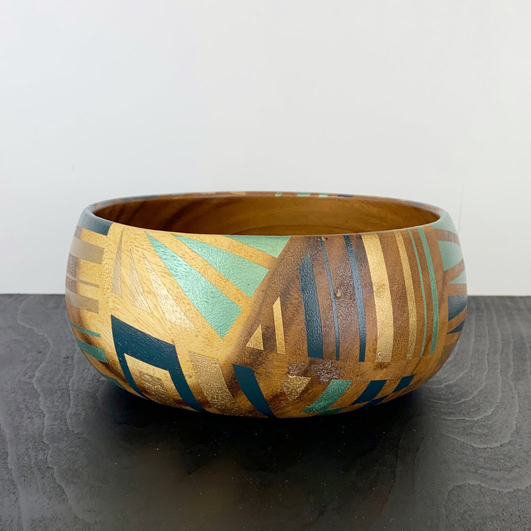 vintage wooden bowl handpainted with a gold and blue geometric design