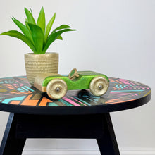 Load image into Gallery viewer, handpainted wooden toy car with green and gold glitter upcycled
