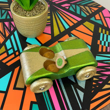 Load image into Gallery viewer, handpainted wooden toy car with green and gold glitter upcycled
