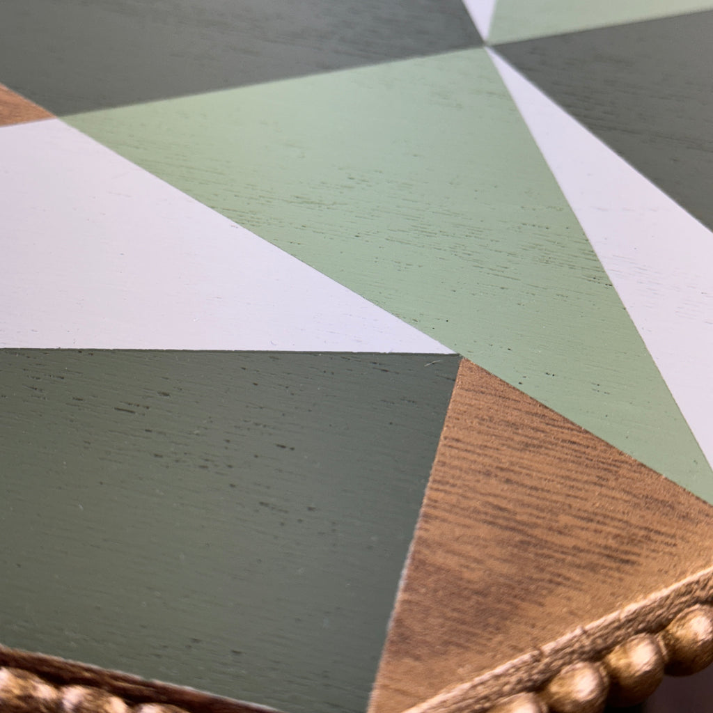 solid oak side table painted in green, grey and gold geometric design