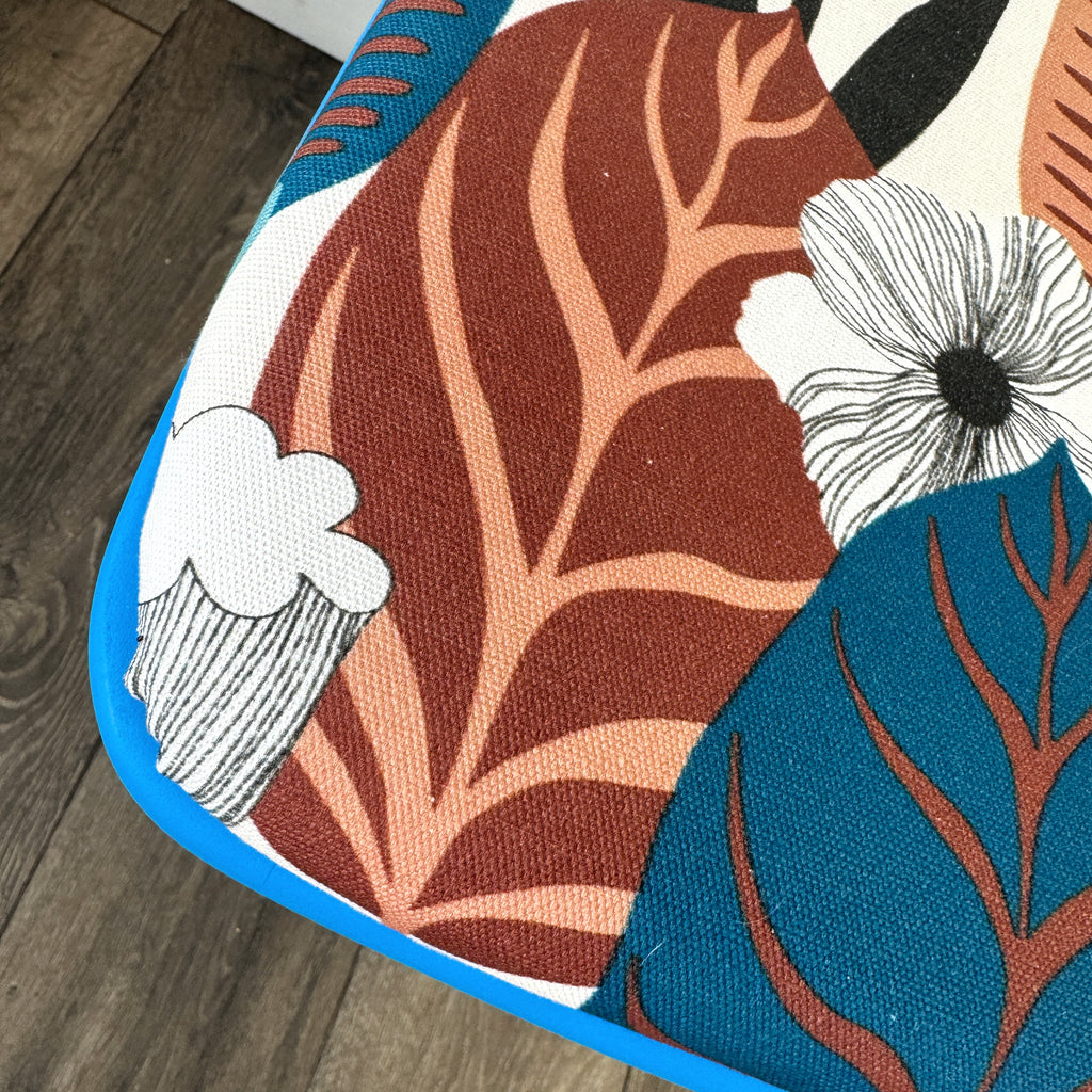 blue painted wooden stool with 1950s inspired flower fabric