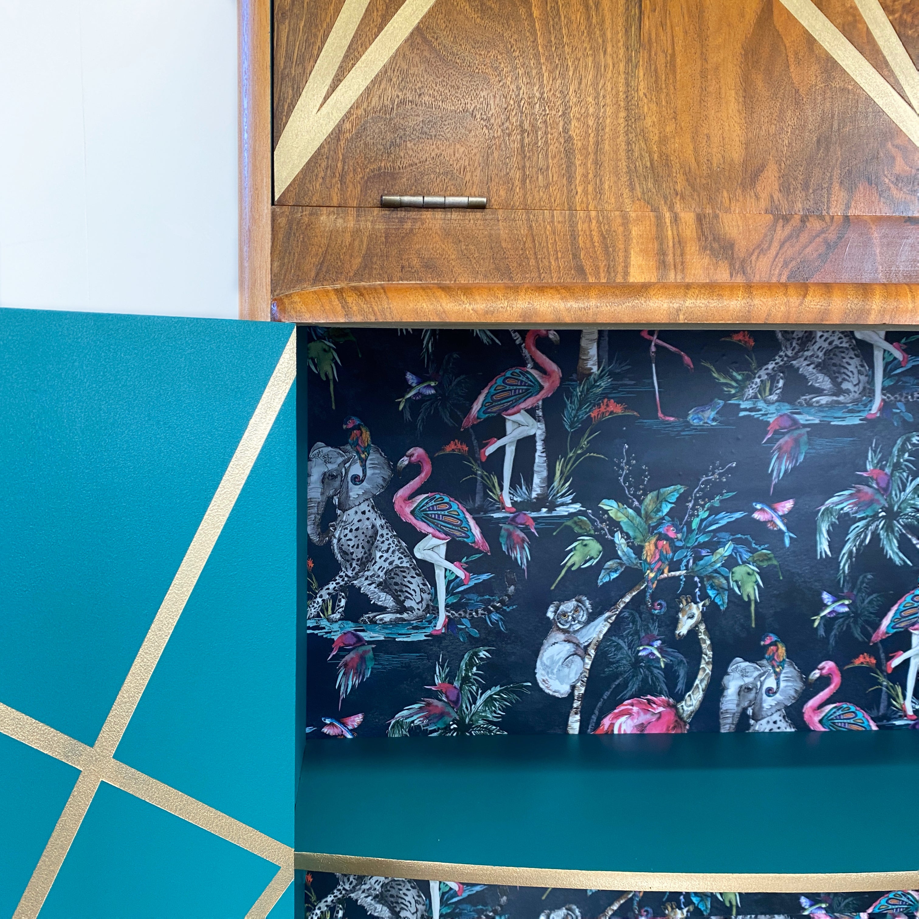 Upcycled drinks cabinet with gold line design