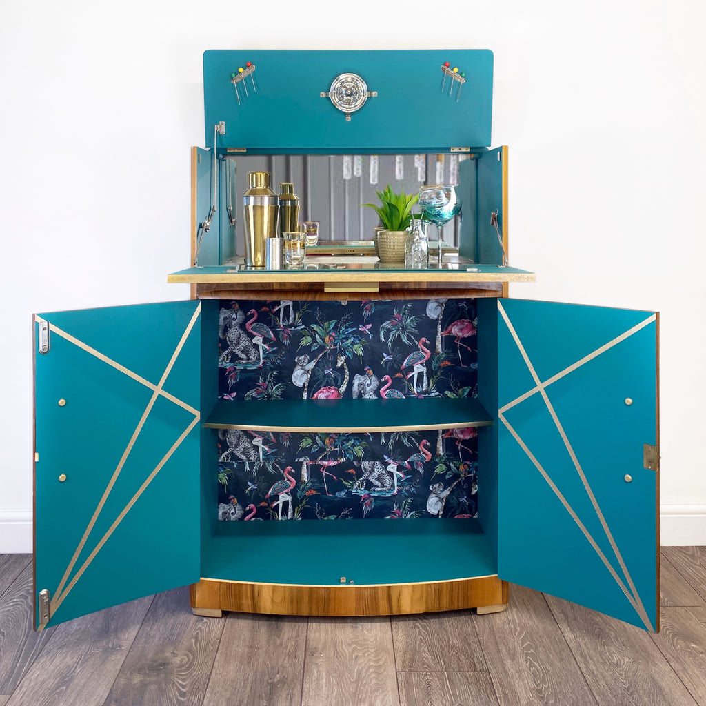Upcycled drinks cabinet with gold line design