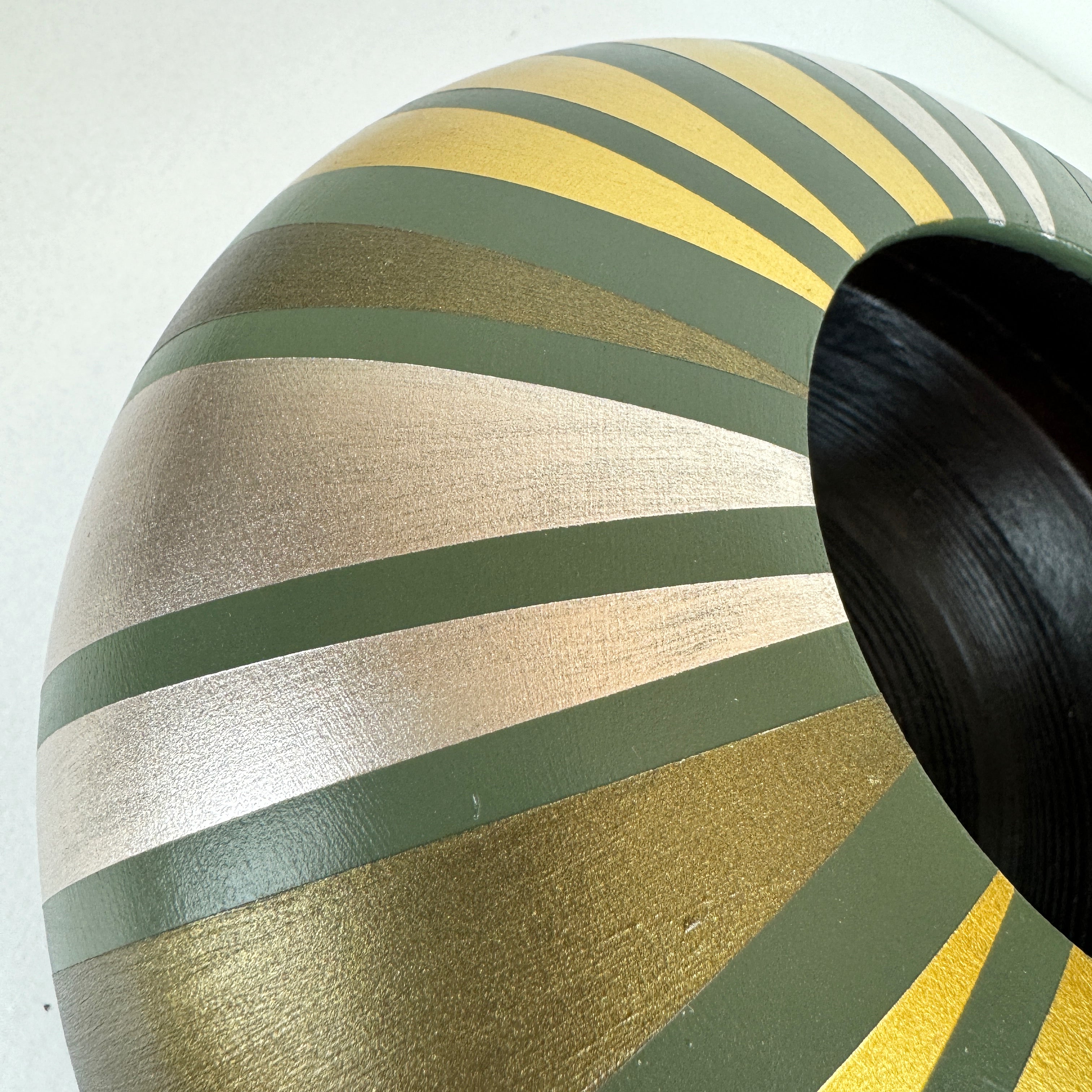 handpainted upcycled wooden bowl in sage green with gold striped design