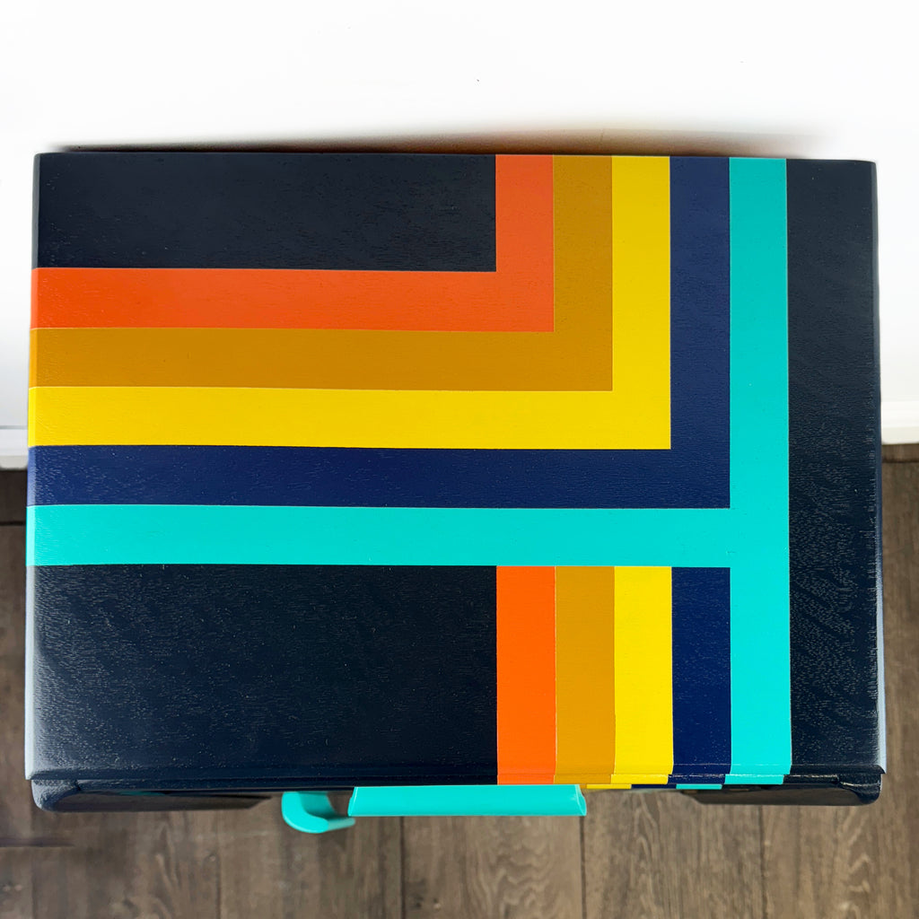 G plan e gomme bedside cabnet painted in navy blue and orange and blue retro stripes