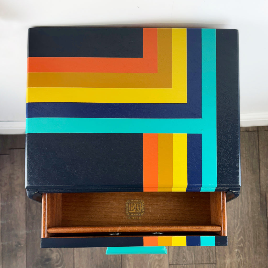 G plan e gomme bedside cabnet painted in navy blue and orange and blue retro stripes