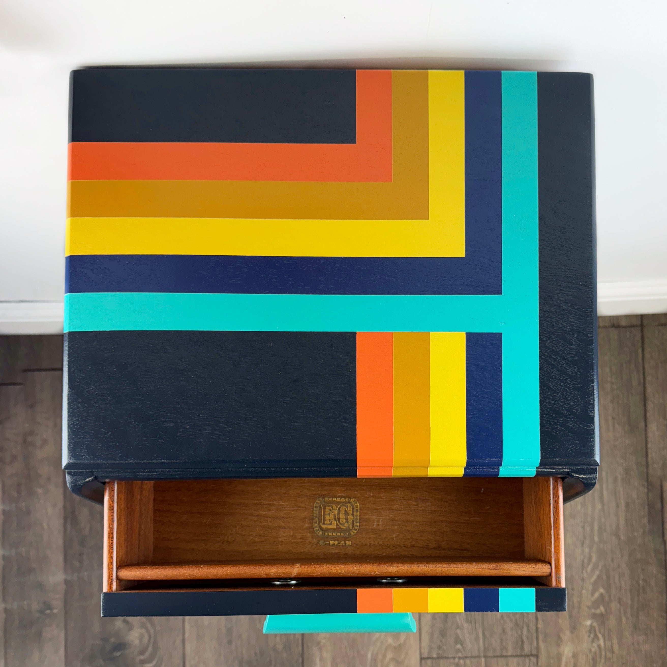 G plan e gomme bedside cabnet painted in navy blue and orange and blue retro stripes