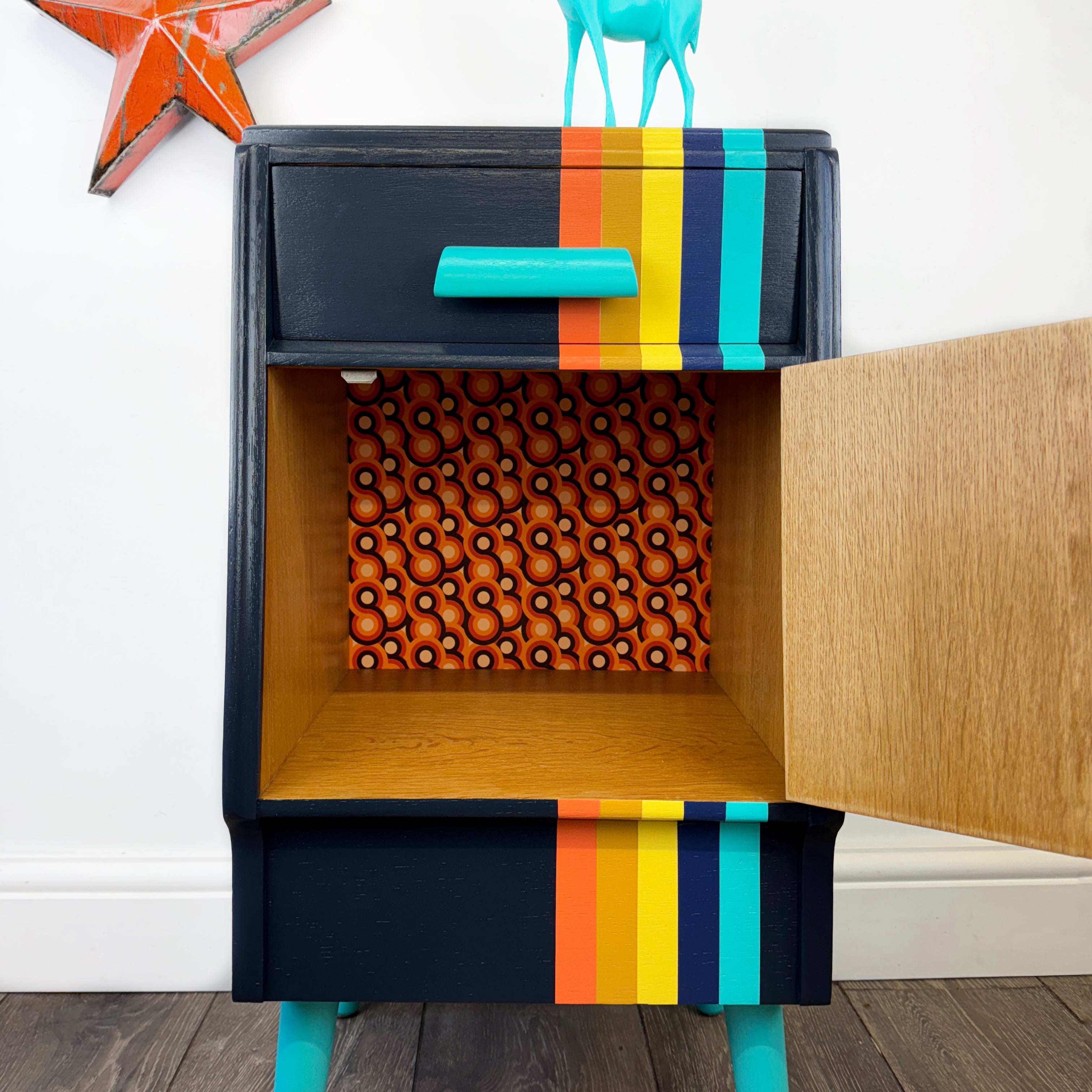 G plan e gomme bedside cabnet painted in navy blue and orange and blue retro stripes