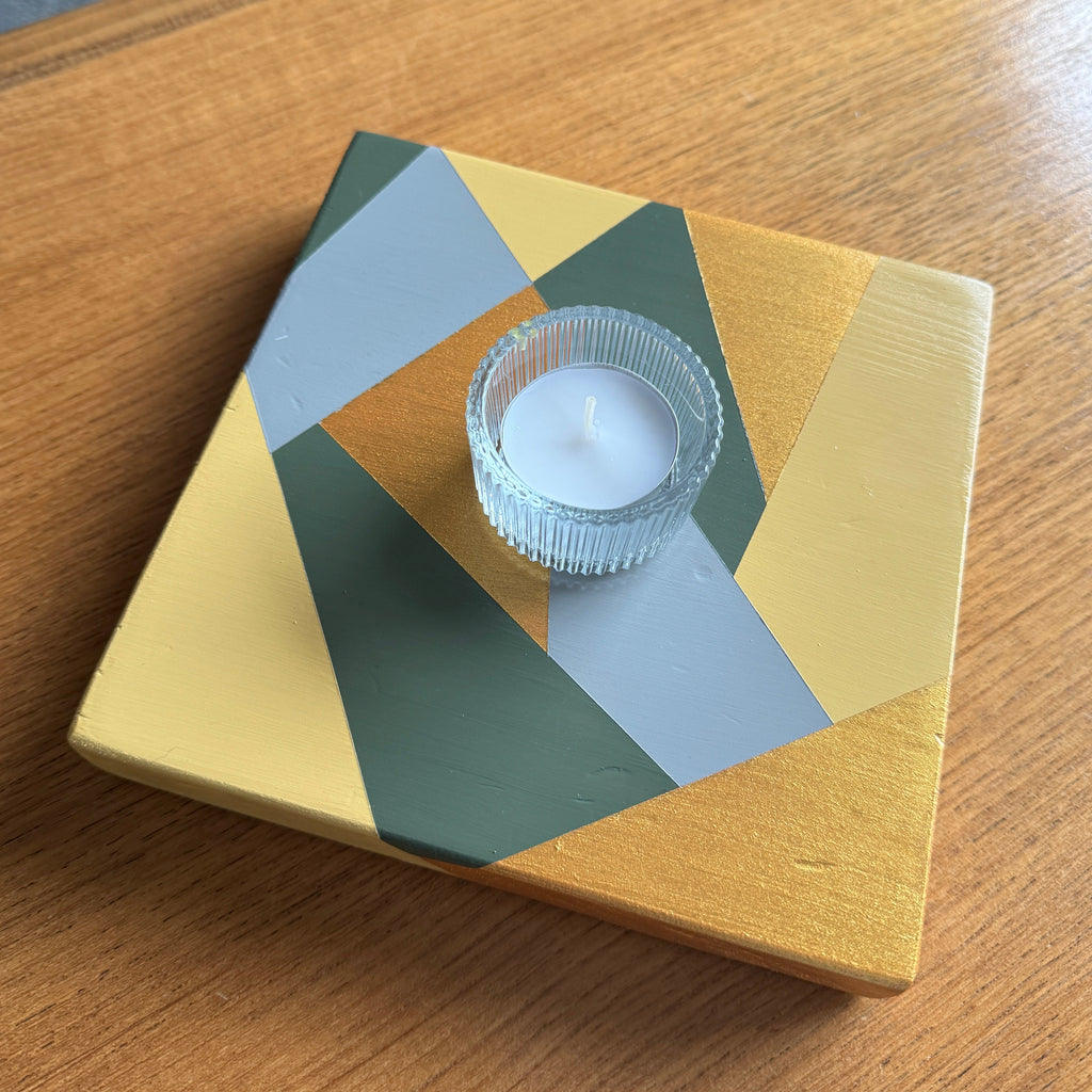 Wooden reclaimed candle holder painted in green and gold