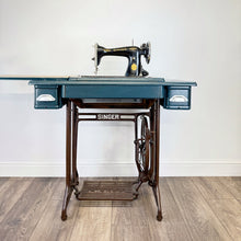 Load image into Gallery viewer, singer sewing machine table painted in blue with silver line design
