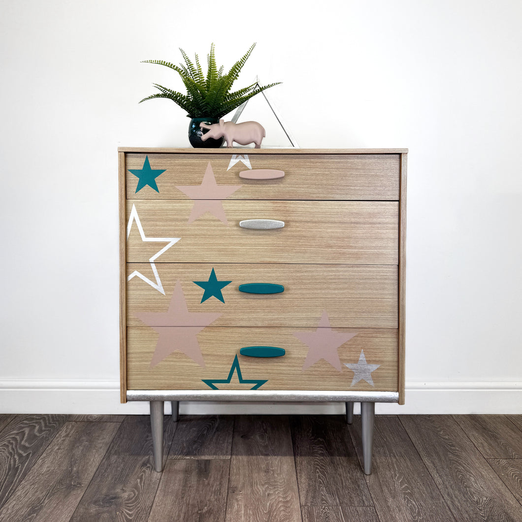 Mid century chest of drawers upcycled with pink teal and silver stars