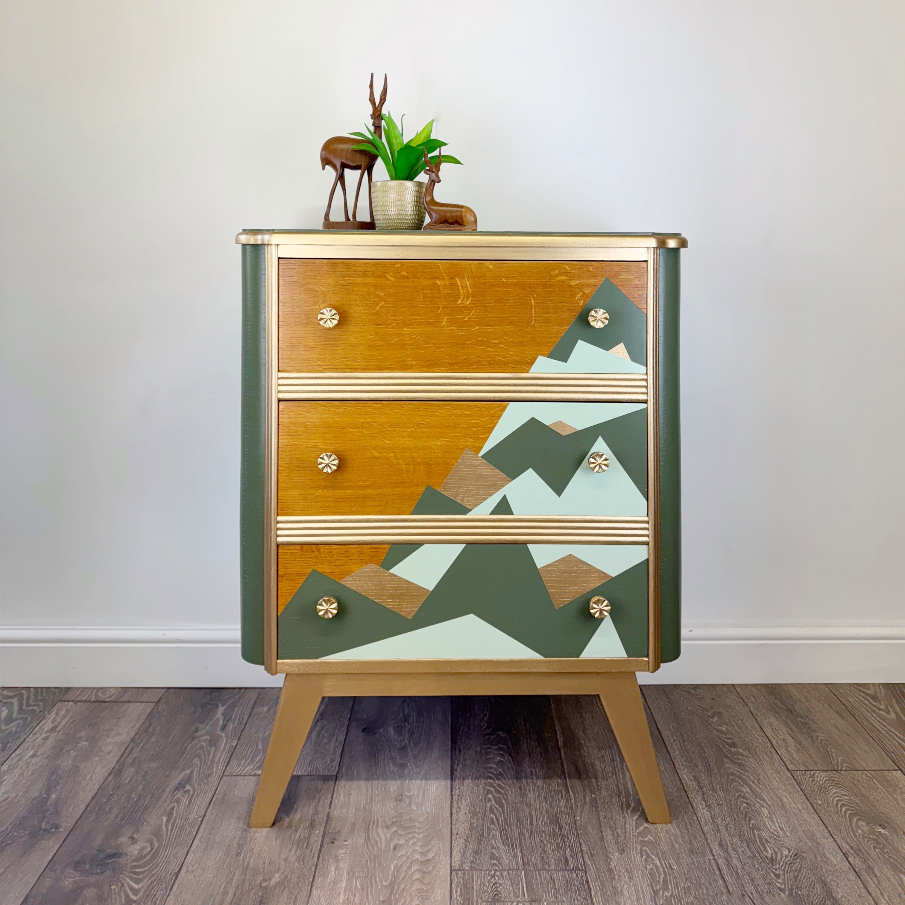 upcycled mid century chest of drawers mountain design in green and gold