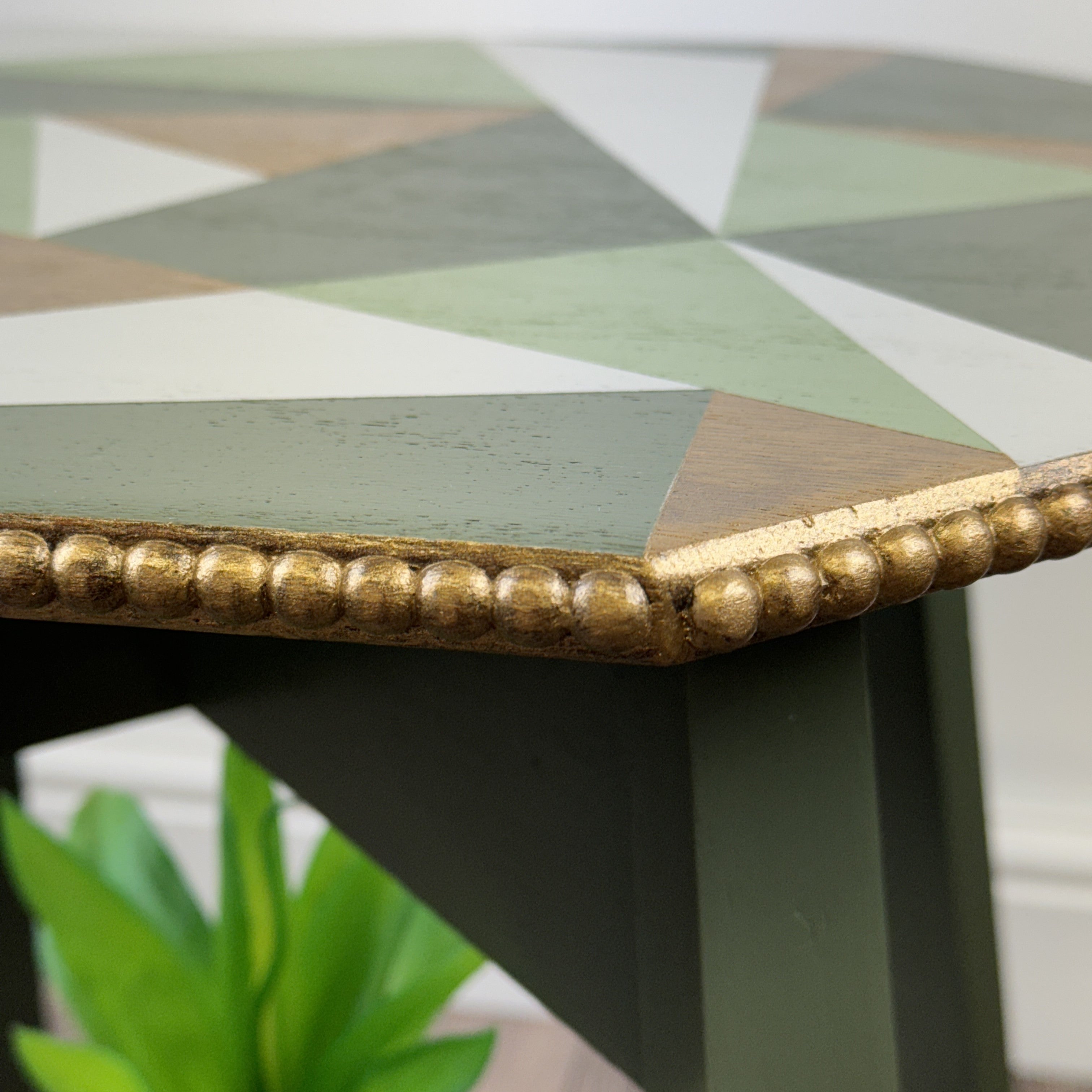 solid oak side table painted in green, grey and gold geometric design