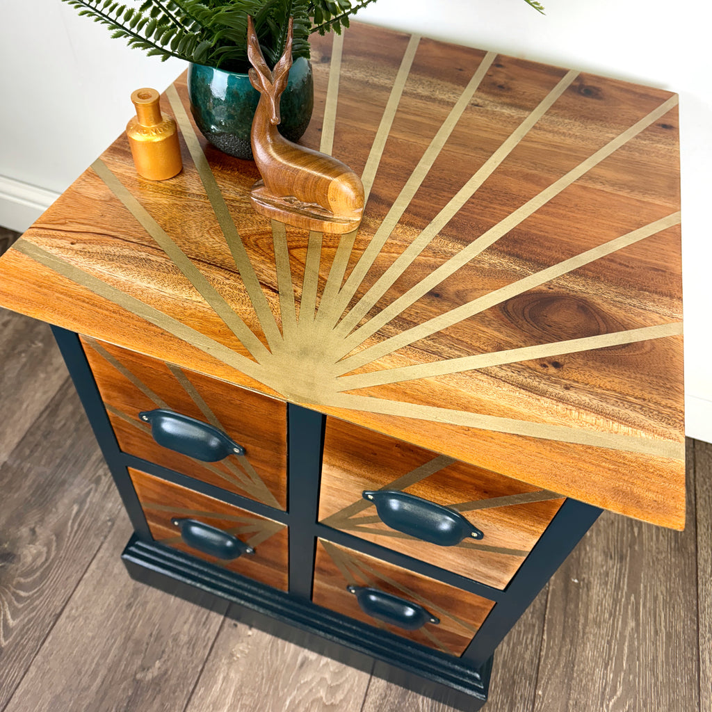Teal and gold handpainted upcycled solid wooden drawers with gold sunburst design on the top and teal cup handles