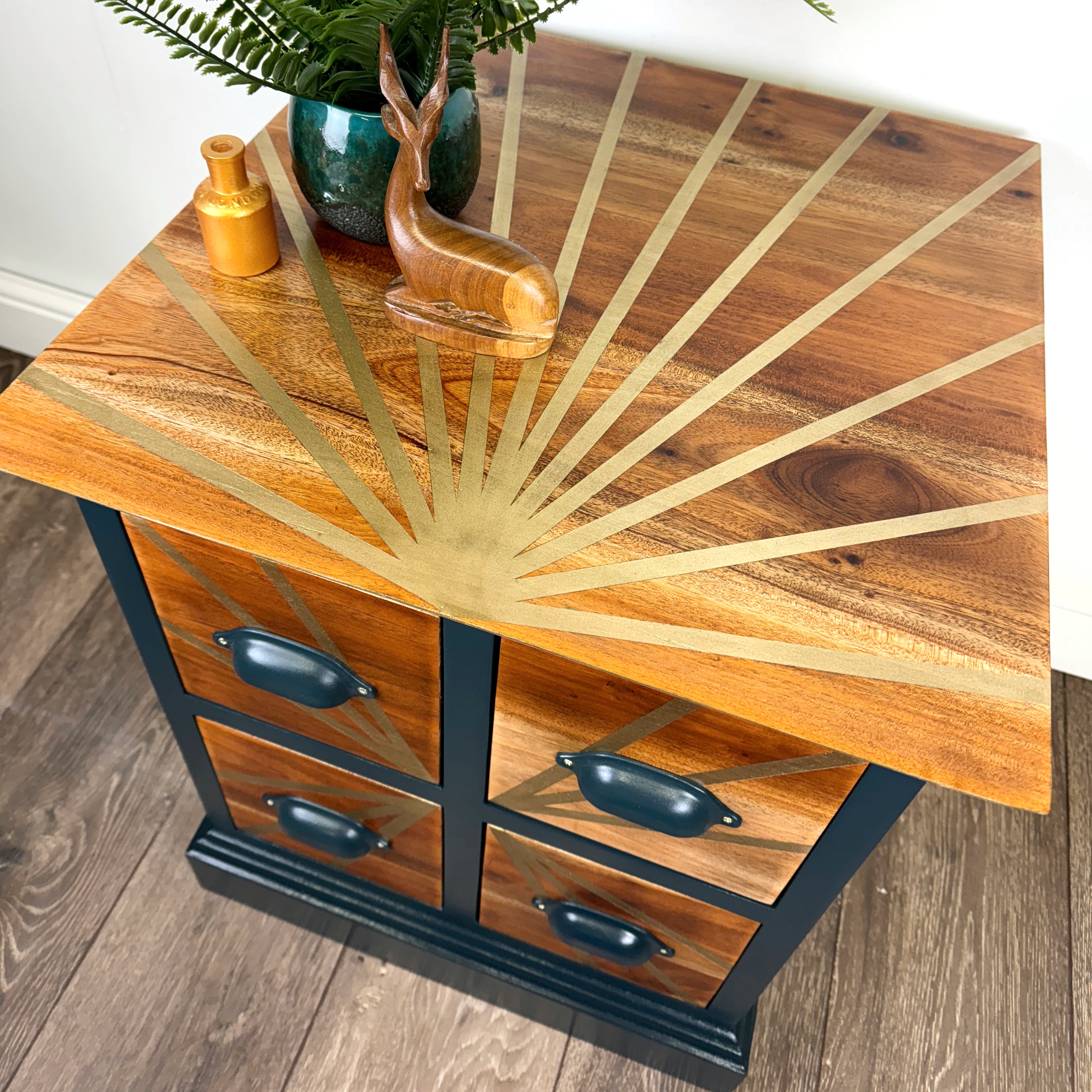 Teal and gold handpainted upcycled solid wooden drawers with gold sunburst design on the top and teal cup handles
