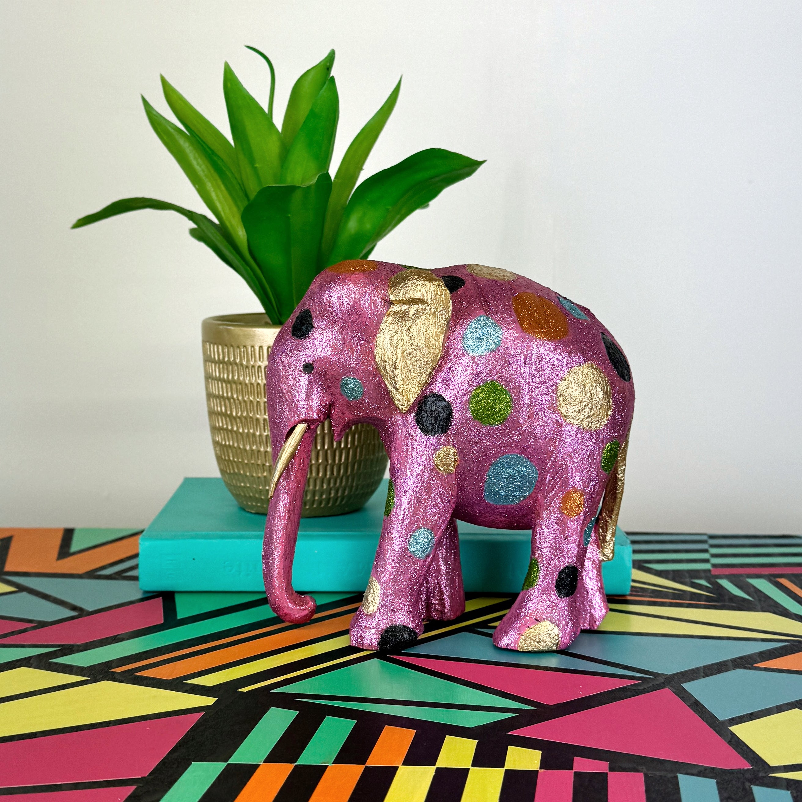 Pink gold and green glitter painted wooden elephant