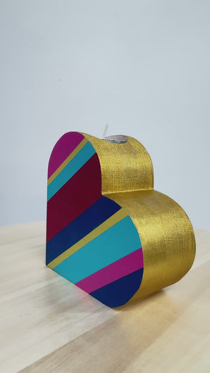 Painted wooden heart tealight holder in multicoloured bright stripes