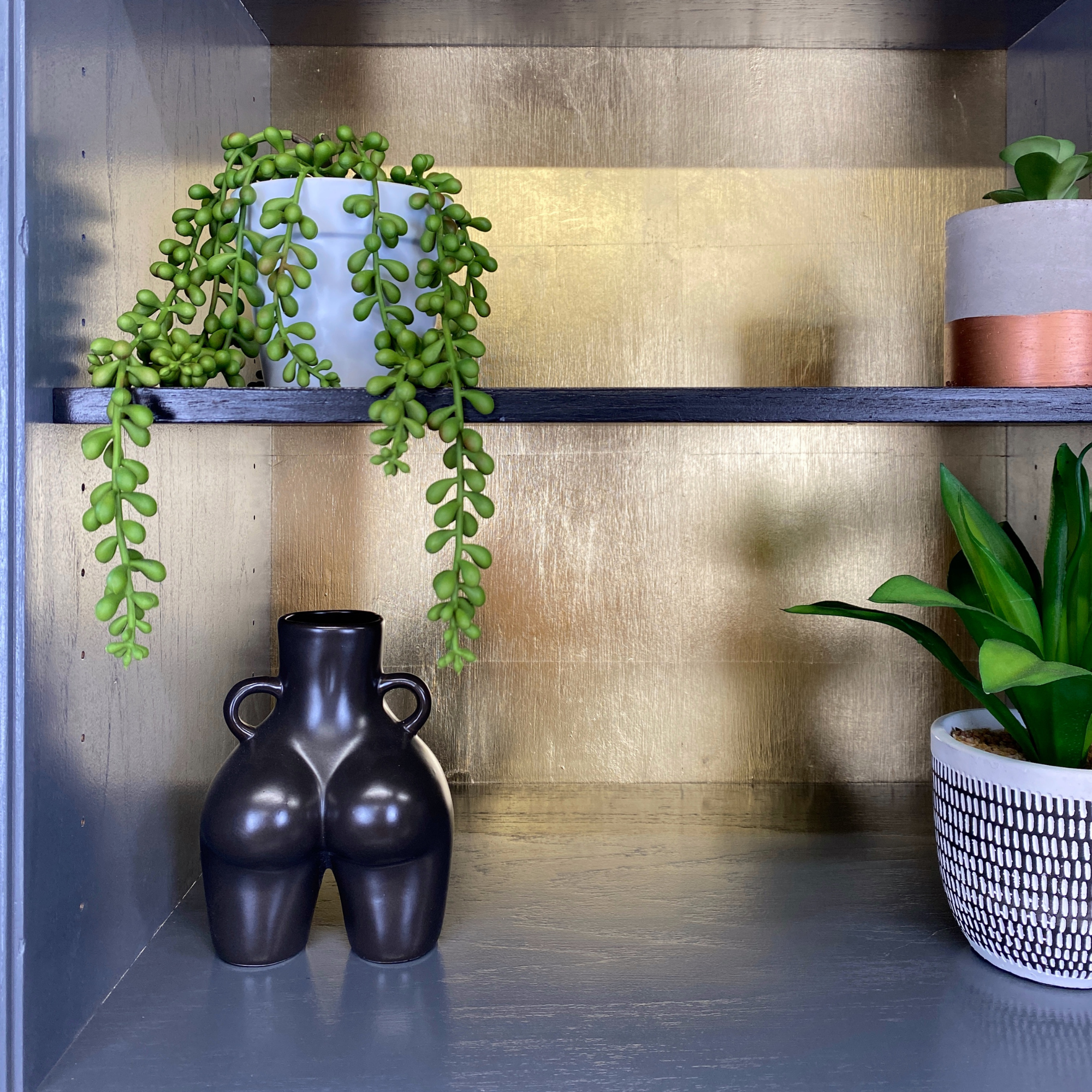 Grey and black upcycled mid century storage unit with handpaingted gold stars