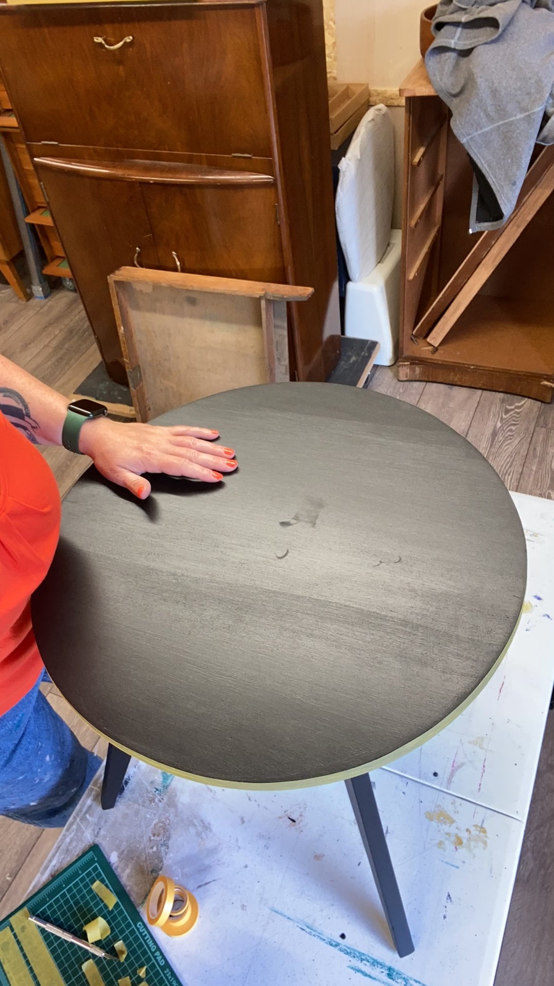 timelapse video of a coffee table being taped up with a geometric design