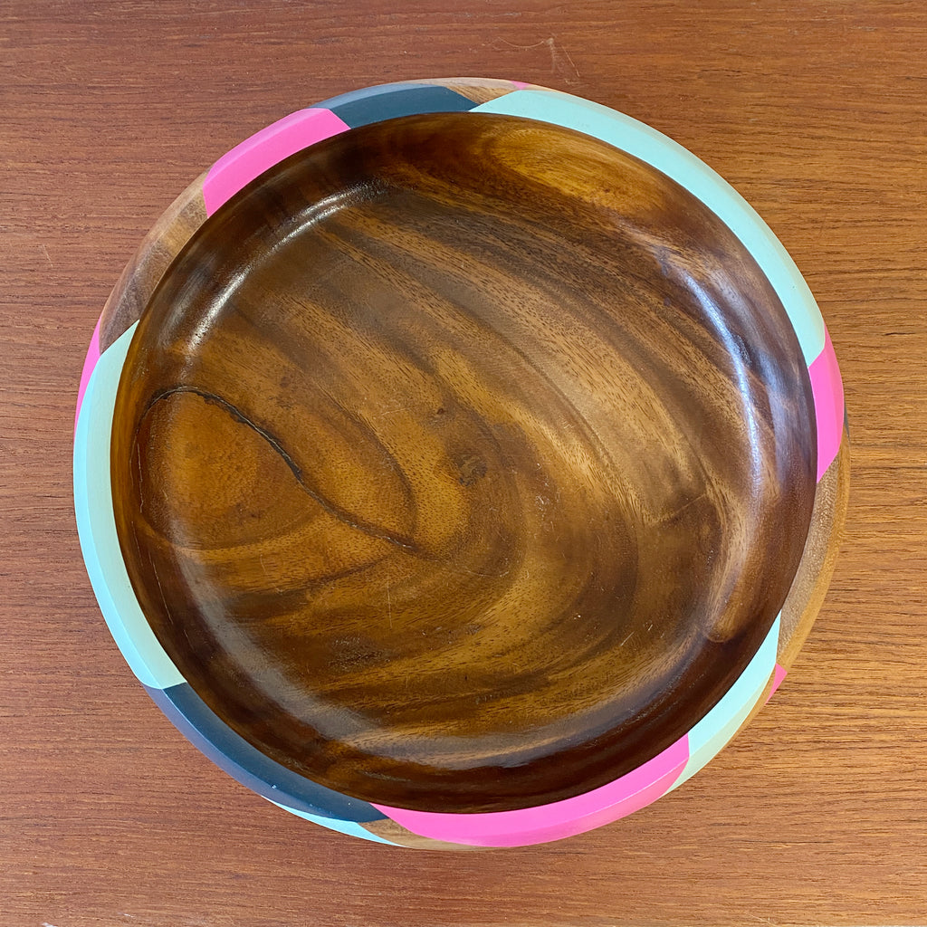 handpainted wooden bowl with triangular geometric design in blue, pink and teal