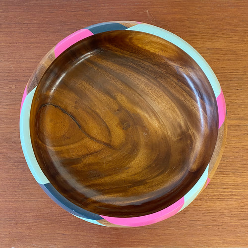 handpainted wooden bowl with triangular geometric design in blue, pink and teal